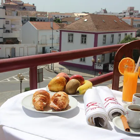 Comendador Отель